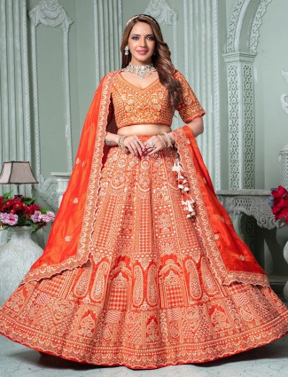 Orange tissue silk lehenga choli for wedding celebrations