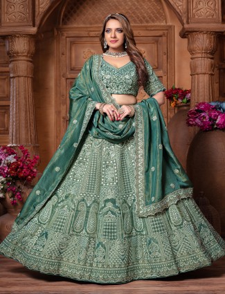 Rama green tissue silk lehenga choli with diamond weaving