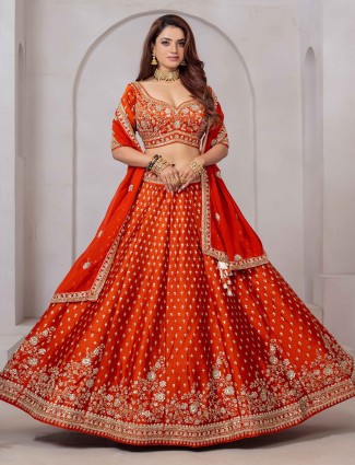 Orange raw silk lehenga choli with cutdana embellishment