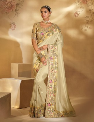 Cream silk saree for festive celebration