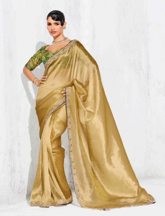 Gold tissue silk saree highlighted for festive