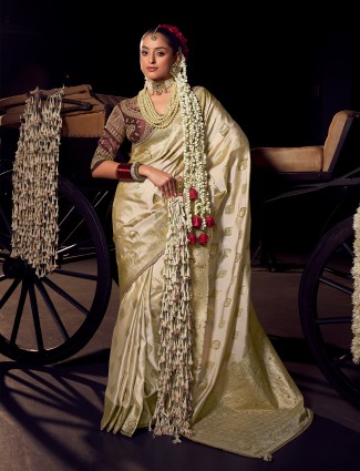 Cream viscose tissue silk saree for elegant wedding ensemble