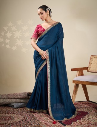 Navy silk plain saree with embellished border