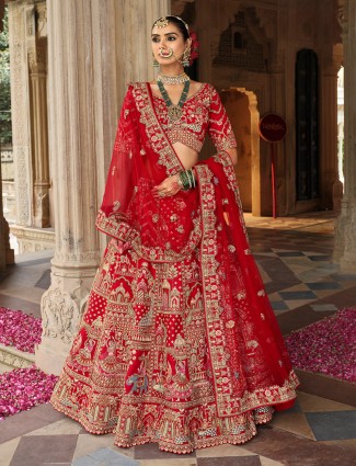 Red silk bridal lehenga choli adorned with sequins and diamond sparkle