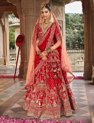 Red silk bridal lehenga choli featuring shimmering sequins detailing