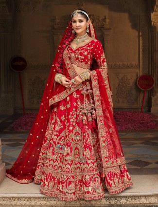 Red silk bridal lehenga choli designed with luminous sequins accents