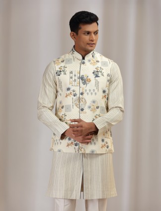 Cream cotton silk waistcoat set enhanced with printed finesse