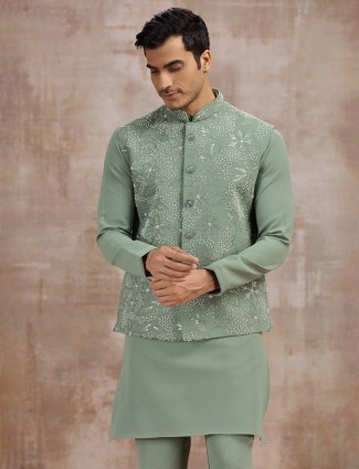 Pista green silk waistcoat set with cutdana work