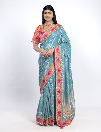 Ocean aqua dola silk saree with contrasting orange blouse