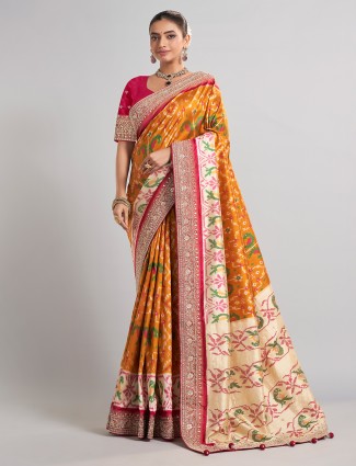 Mustard yellow patola silk saree for haldi