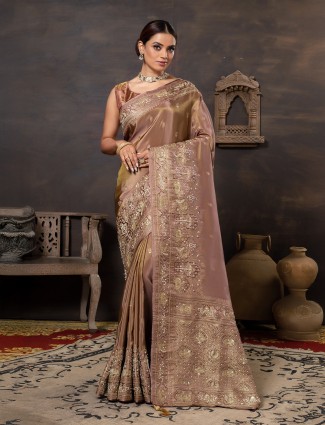 Trendy pastel brown dola silk saree