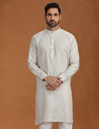 Cream embroidered kurta set with linen fabric