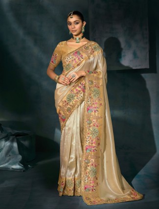 Cream silk saree styled for graceful wedding occasions
