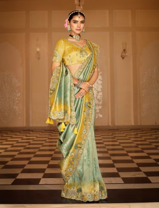 Pista green shaded silk saree for celebrations