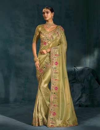 Pista green silk saree designed for wedding festivities