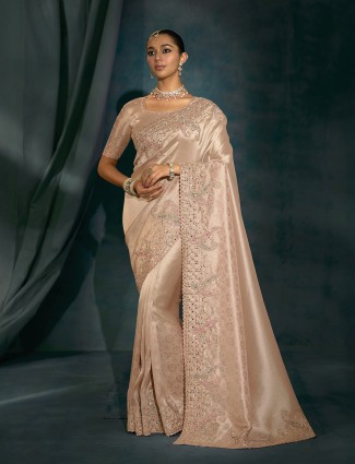 Rose gold silk festive saree featuring mirror embellishment