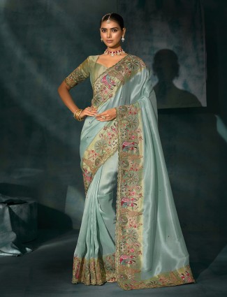 Sea green silk saree with pista toned shaded border